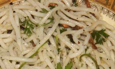 Bangladeshi/Marma Food: Rice noodles dressed with oil, fried onions and cilantro leaves