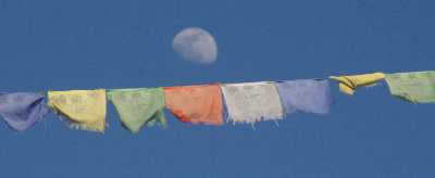 Buddhist prayer flags and moon near Basantapur  Bazar, Nepal