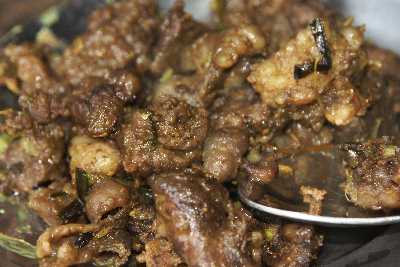 Nepalese Food: Mutton fry (including stomach and intestines) Gurung style
