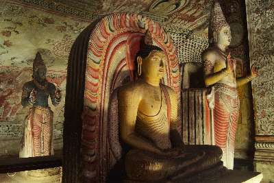 Buddha (and Hindu god) statues in Cave 2 of Dambulla Rock Temple , in Dambulla (Sri Lanka, Cultural Triangle)