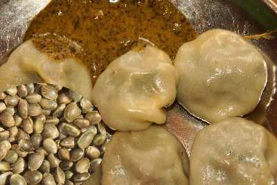 Nepali food: Momos served with hemp seed sauce (Bhango)