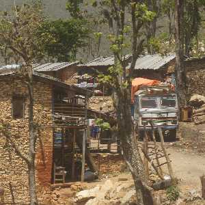 Truck crossing a village, view from Karnali Highway (Surkhet to Jumla, Western Nepal)