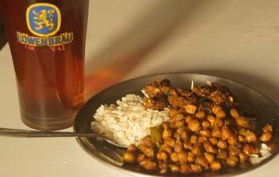 Nepali/Newari Food: Choila, Chiura and Chana served with black tea in a Bawarian beer glass 