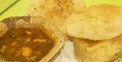 Indian / Bengali Food: Puri with Nigella seeds and potato curry