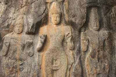 Mahayana Buddhist rock carving (Avalokiteshvara, Tara) in Buduruwagala, near Wellawaya, South-Eastern Sri Lanka