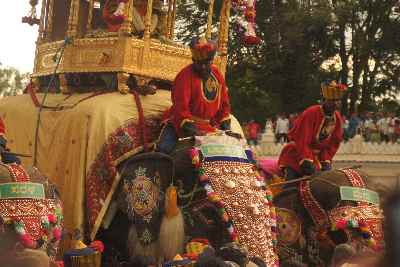 Elephant carrying golden howrah with Durga idol at Dasara (Dussehra) festival procession in Mysore, Karnataka, India