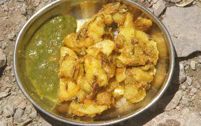 North Indian Food: Alu Jira (Roast potato with Cumin) served with mint chutney 