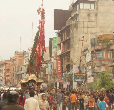 Chariot (Ratha) is moved through the crowded streets during the Rato Machendranath Jatra festival in Patan, Kathmandu Valley, Nepal
