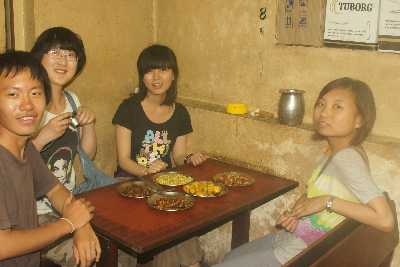 Chinese tourists enjoying Newari Food in Wo Chhen Khaja Ghar in Naghal/Bangemudha, Kathmandu