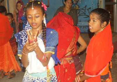 Girl dancing at Diwali Hindu Festival (Tihar) in Pokhara, Nepal