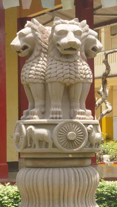 Replica of Ashoka column with four lions inside the Chinese Buddhist Temple in Sarnath, near Varanasi, Uttar Pradesh (India)